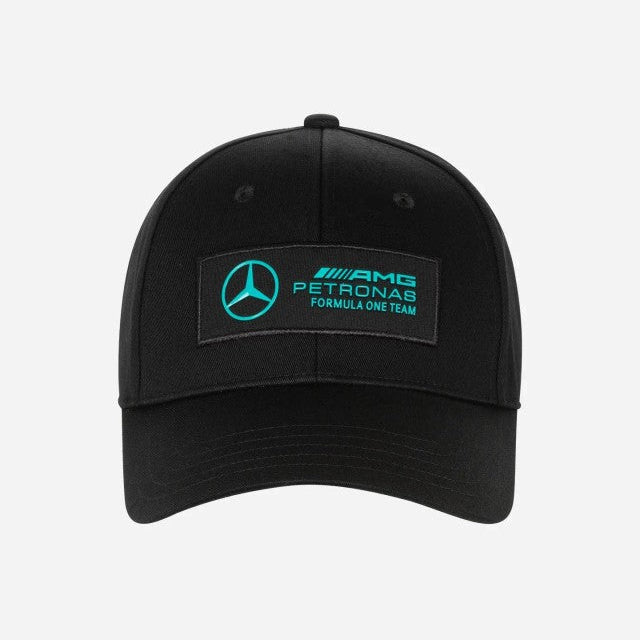 Black cap with Mercedes-Benz Petronas Formula One Team logo on a white background